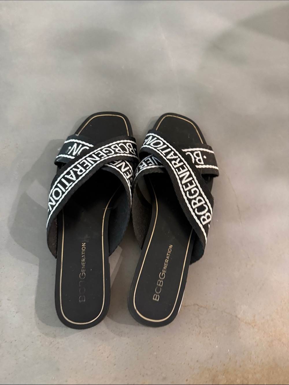 BCBGeneration Black and White Logo Crisscross Slide Sandals